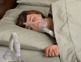 person wearing cpap machine